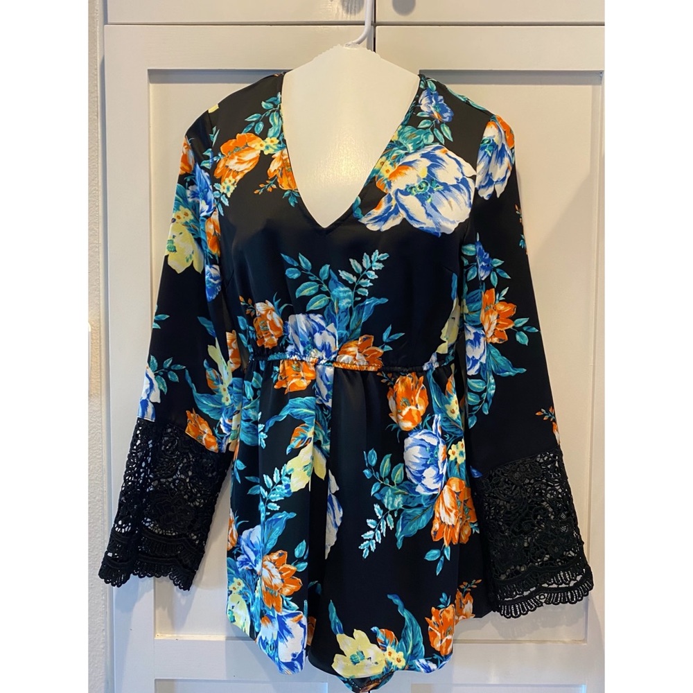 Floral romper with lace bell sleeves